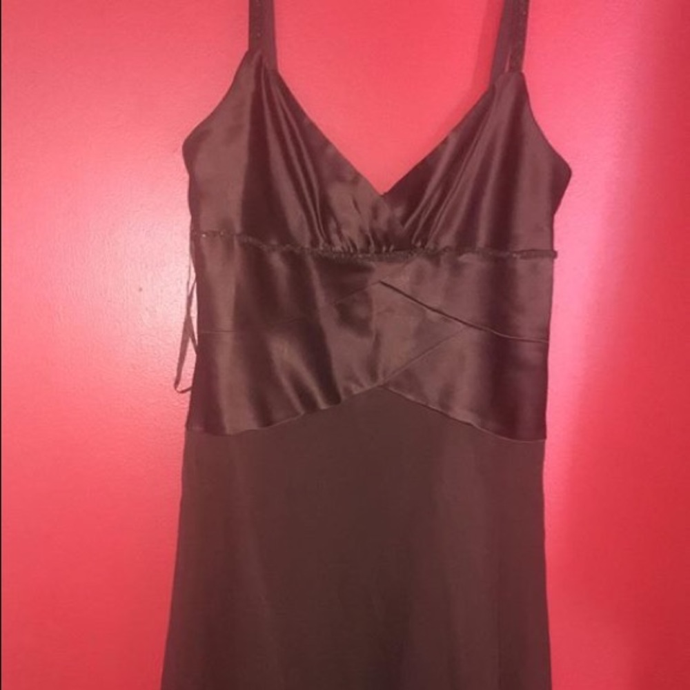 Dress worn once to a wedding. Beaded design.
